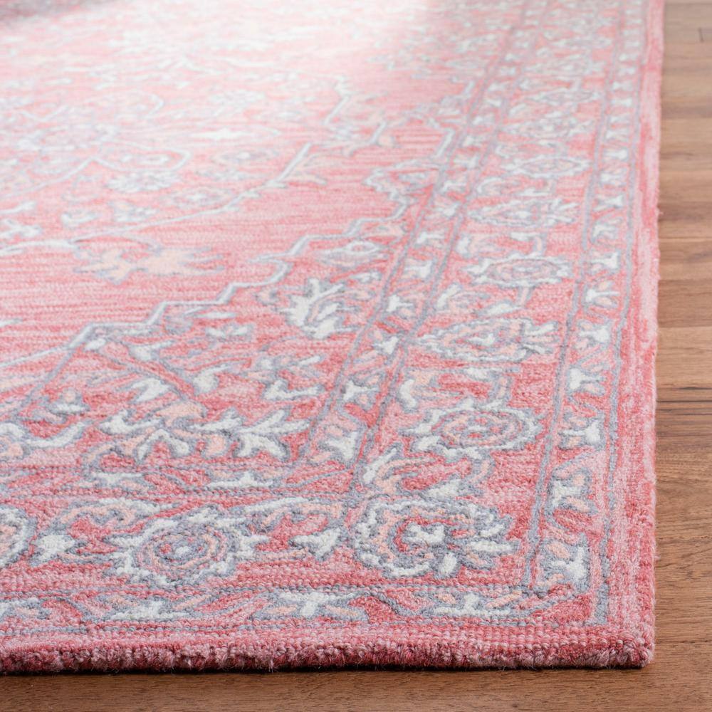 Handmade Pink and Ivory Wool Tufted Rectangular Area Rug 5' x 8'