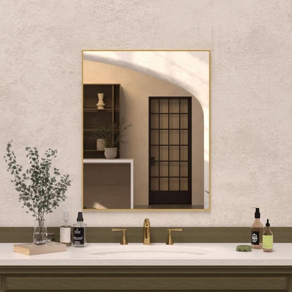 Hermitage Bath Oblivion 24 in. W. x 30 in. H Rectangular Framed Wall Bathroom Vanity Mirror in Brass