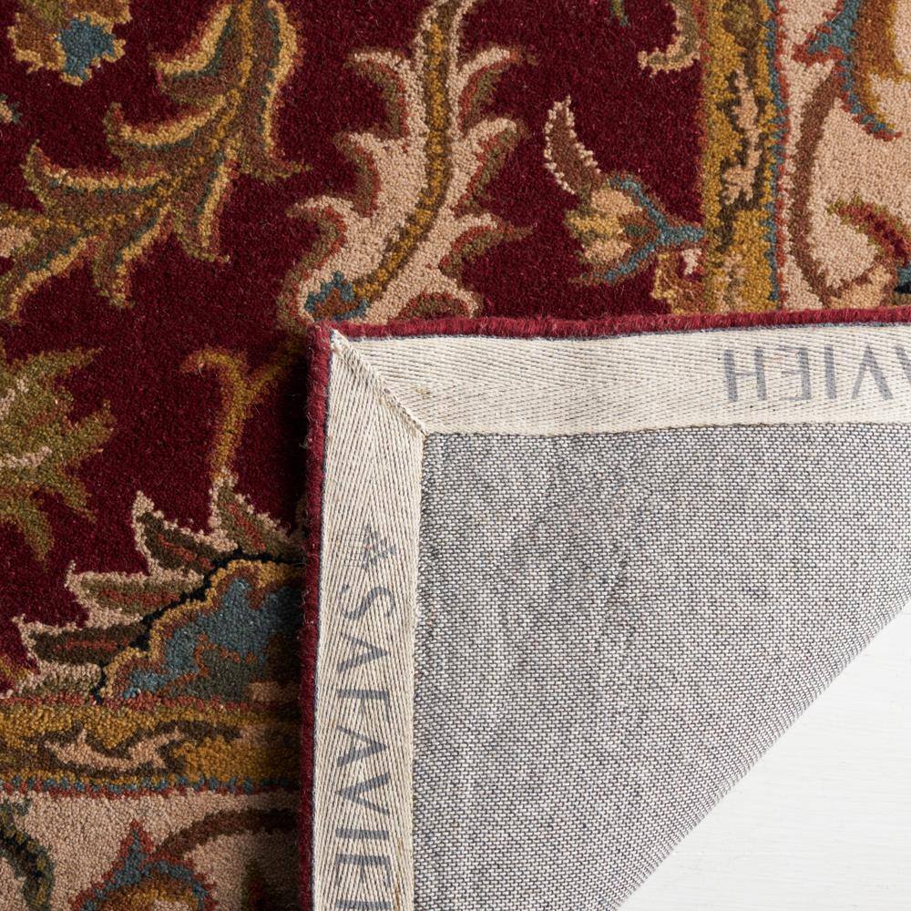 Hand-Tufted Red and Ivory Wool Oval Area Rug 8' x 10'