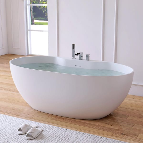 63 in. x 31.5 in. Stone Resin Solid Surface Matte Flatbottom Freestanding Soaking Bathtub in White with Faucets