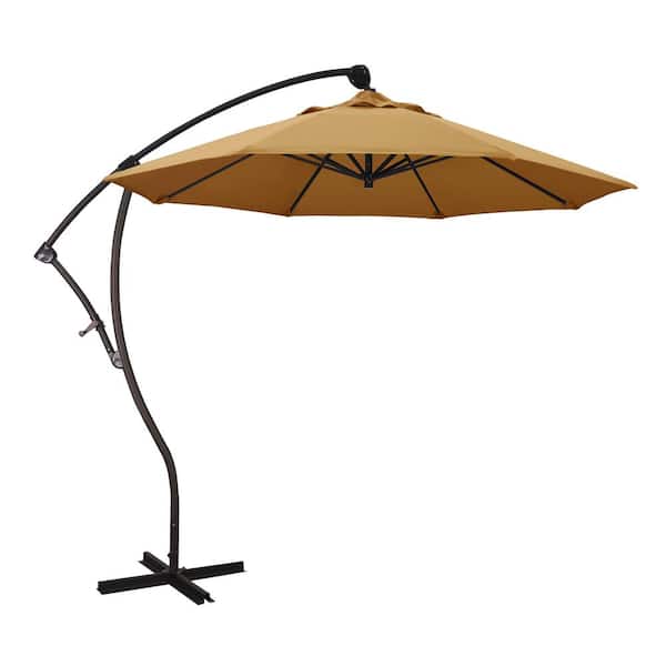 California Umbrella 9 ft. Bronze Aluminum Cantilever Patio Umbrella with Crank Open 360 Rotation in Wheat Sunbrella