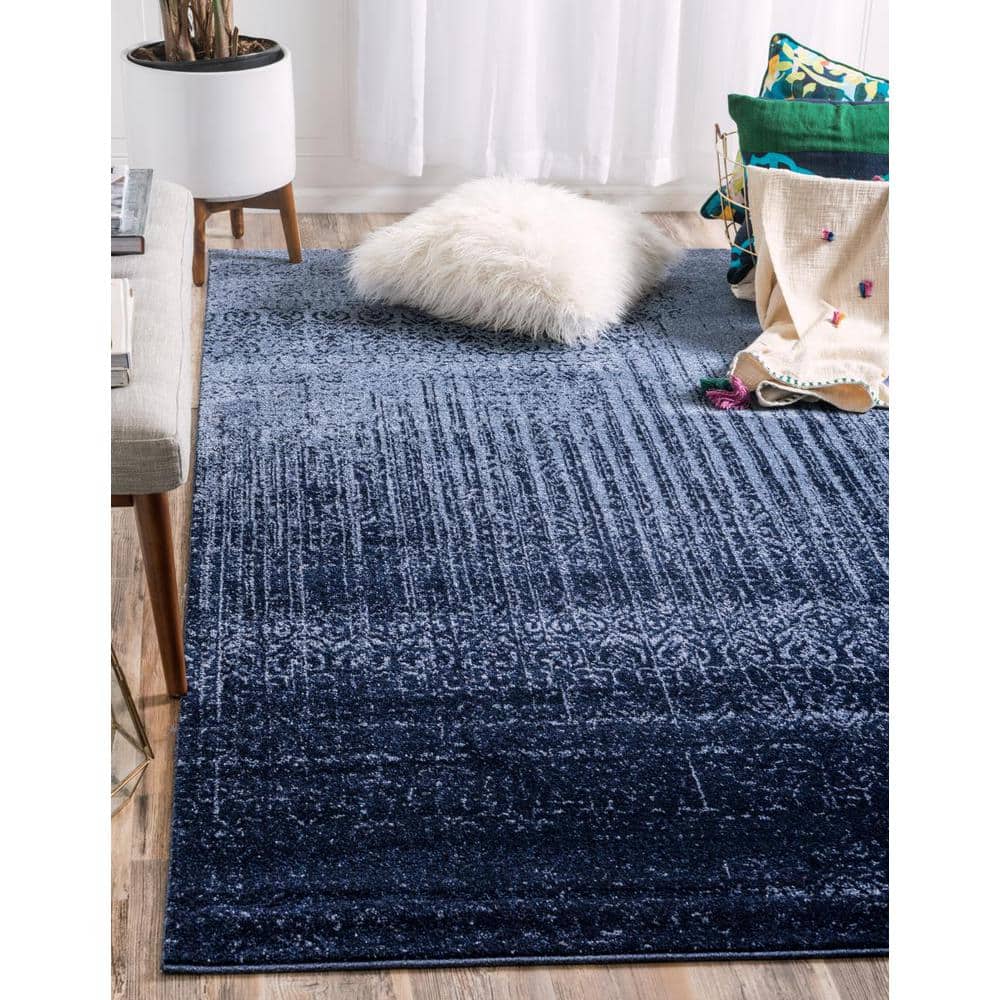 Blue Tufted Washable Reversible 6' x 9' Synthetic Rug