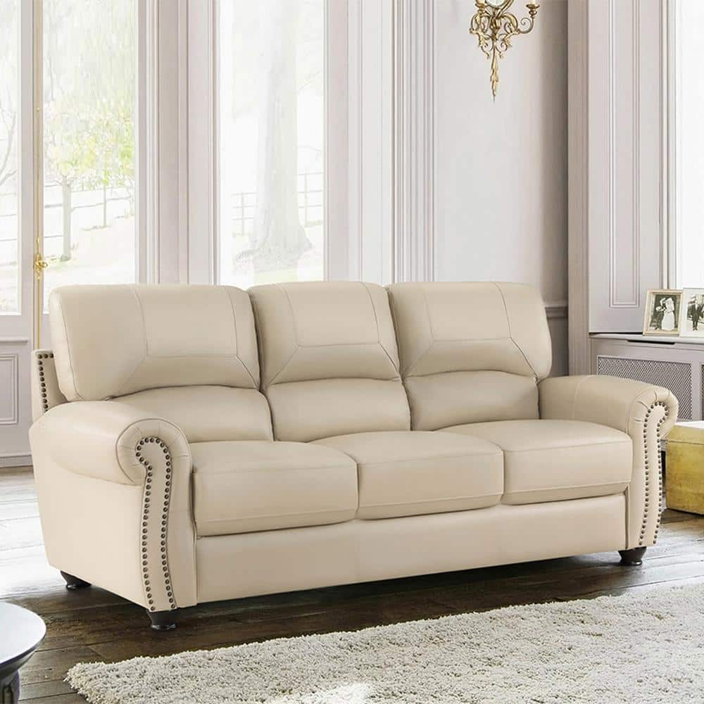 Cream Faux Leather Tufted Sofa with Nailhead Trim
