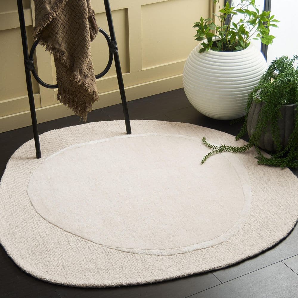 SAFAVIEH Novelty 3 ft. x 3 ft. Ivory Modern Solid Specialty Area Rug ...