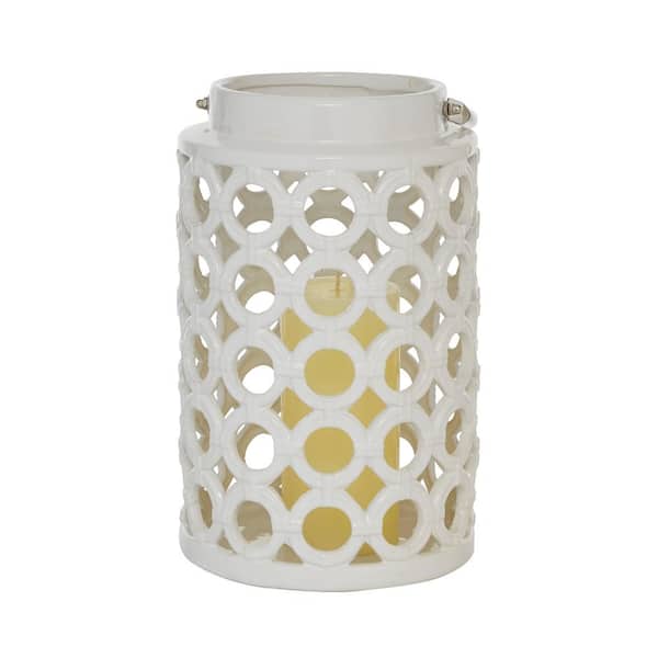 Litton Lane 11 in. H White Ceramic Circles Decorative Candle Lantern with Cut Out Design