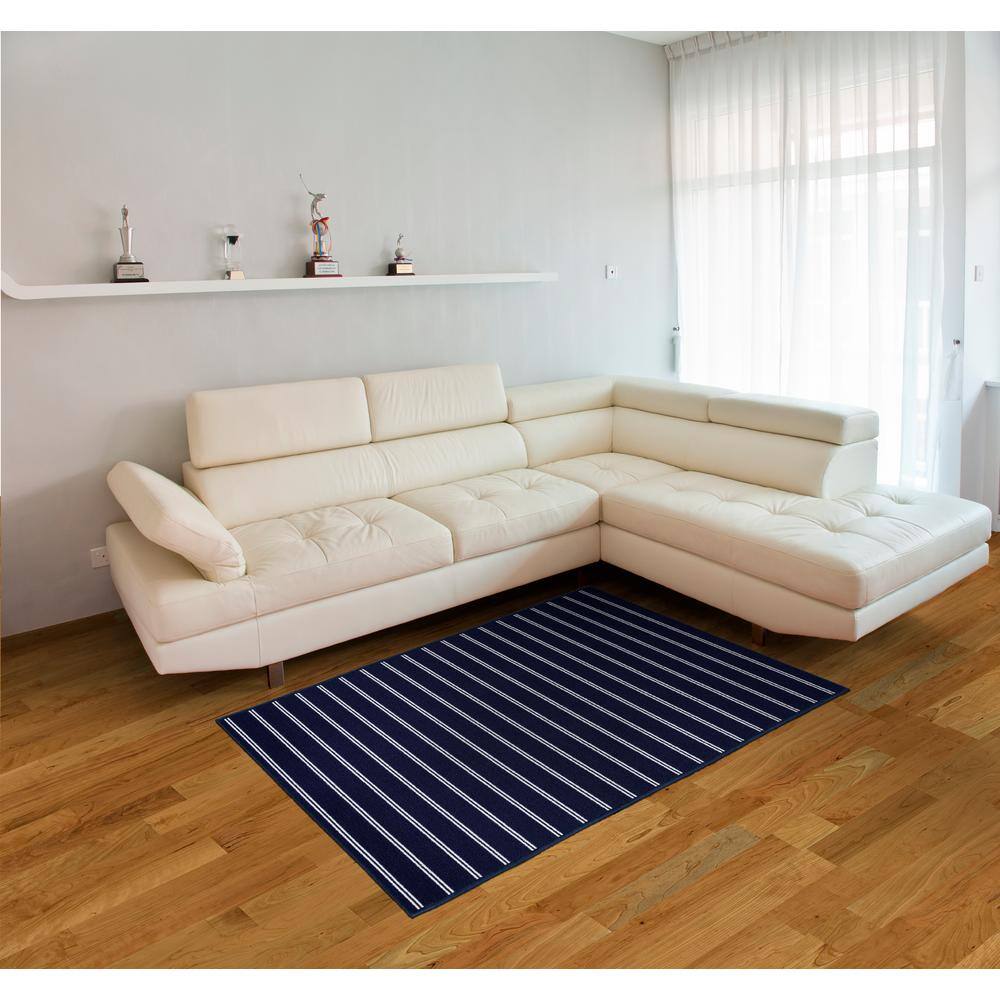 Avery 5' x 7' Blue Tufted Synthetic Stripe Area Rug