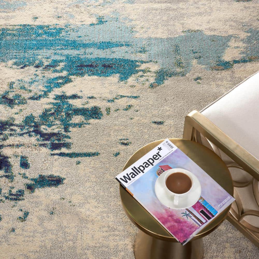 Celestial Swirl 9' x 12' Ivory & Teal Blue Abstract Synthetic Rug