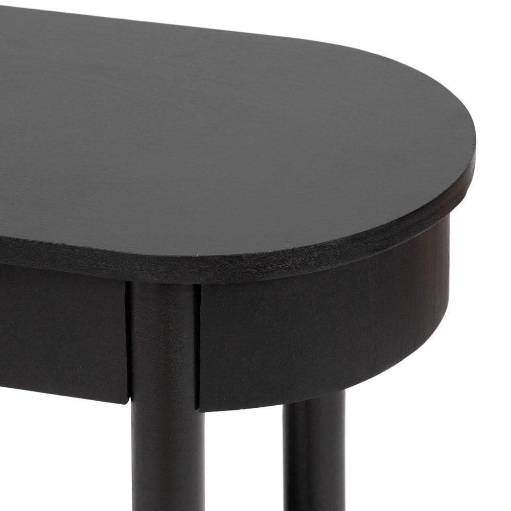 Close-up detail of the black capsule oval end table top edge.