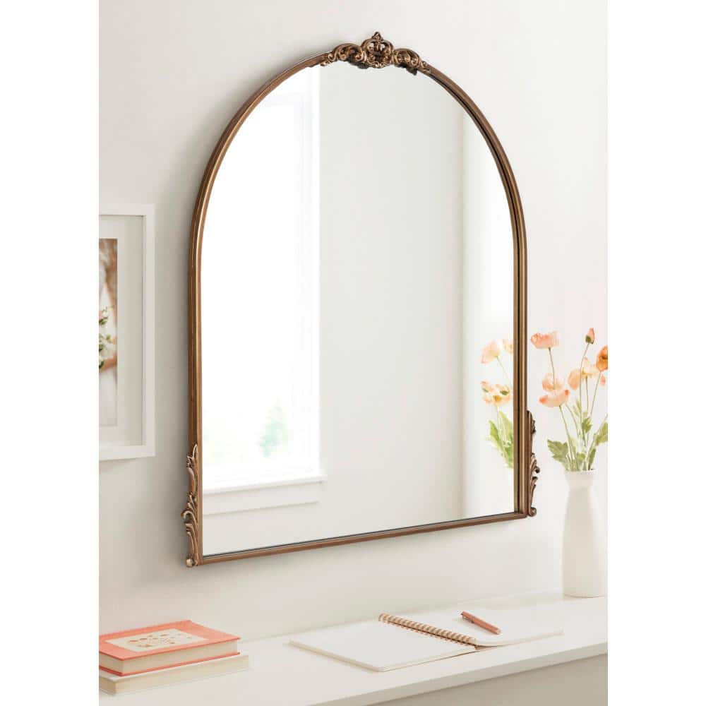 Myrcelle Antique Gold Arched Wall Mirror with Garland Details