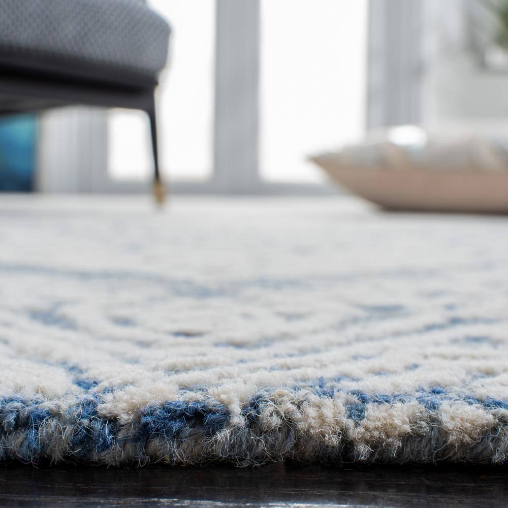 Handmade Blue Floral Wool 4' x 6' Area Rug