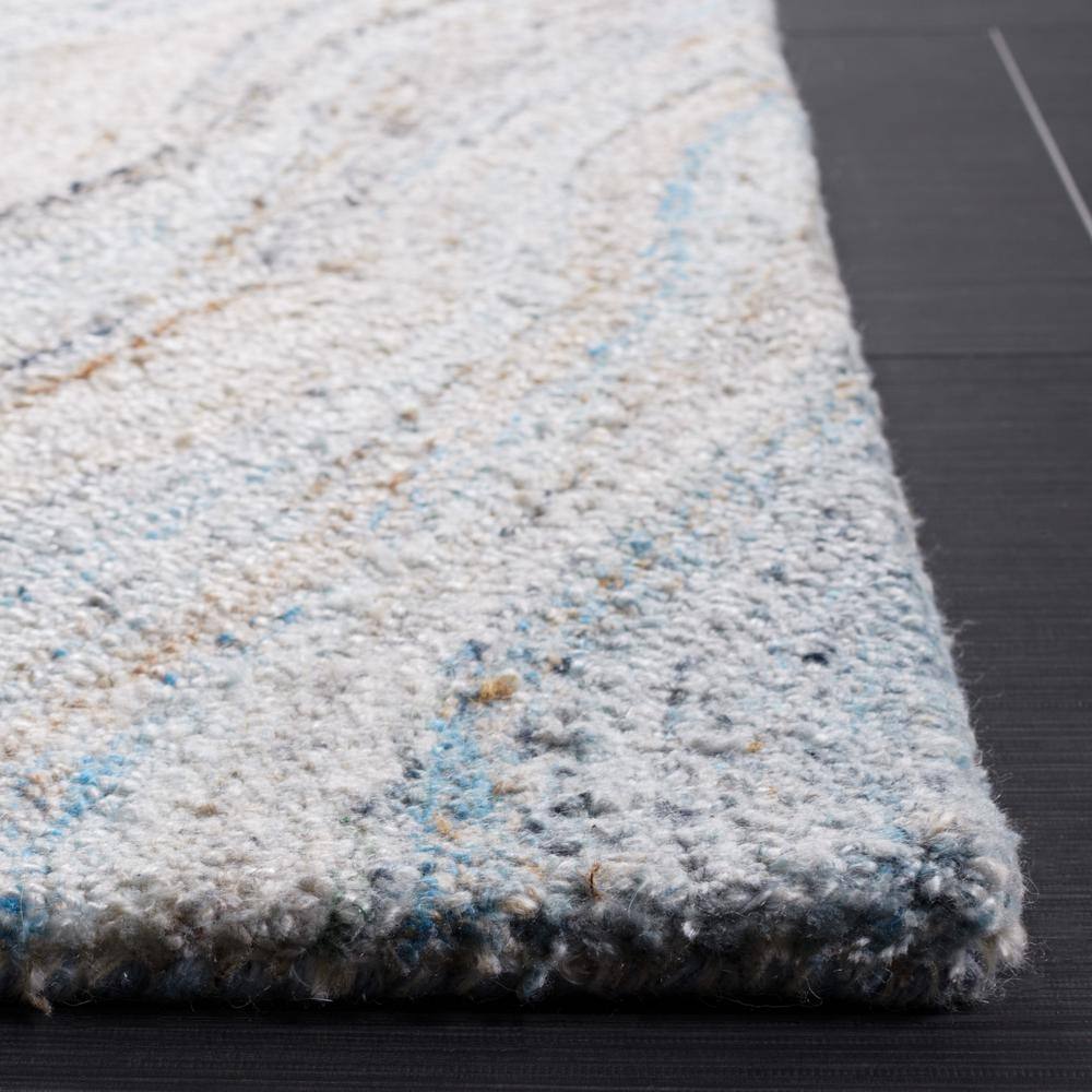Blue and Beige Abstract Wool 8' x 10' Area Rug