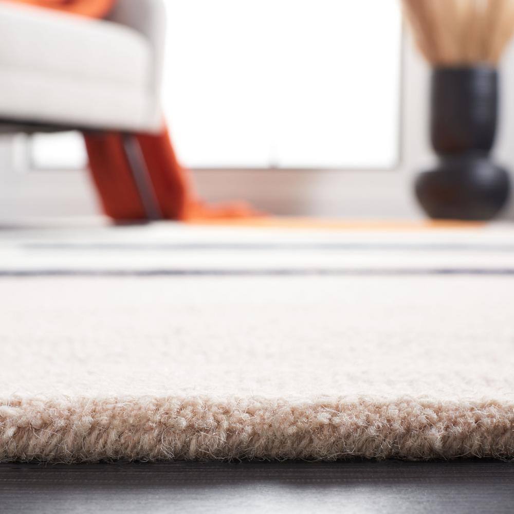 Rodeo Drive 6' x 9' Black and Orange Hand-Tufted Wool Rug