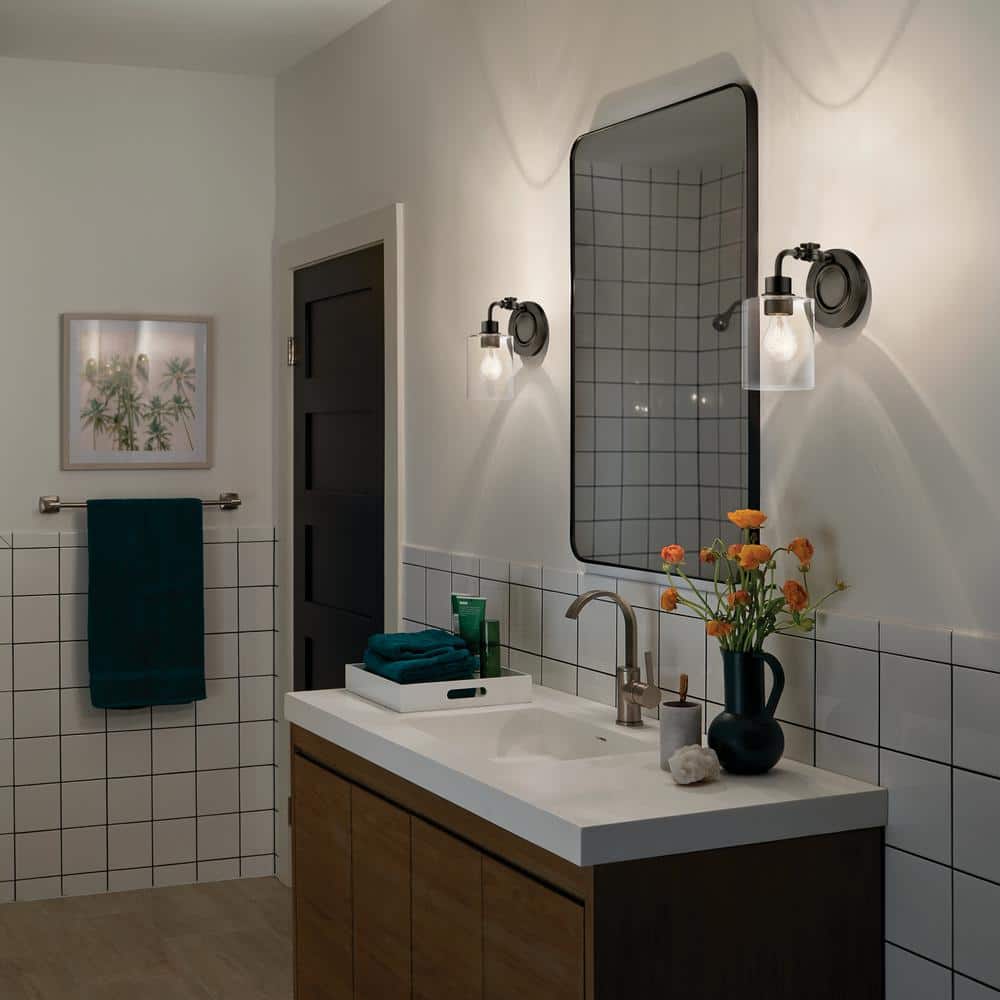 Black Steel Cylinder Wall Sconce with Clear Seeded Glass Shade