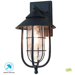 Wisteria Collection 1-Light Sand Black Outdoor Wall Lantern Sconce with Clear Glass Shade