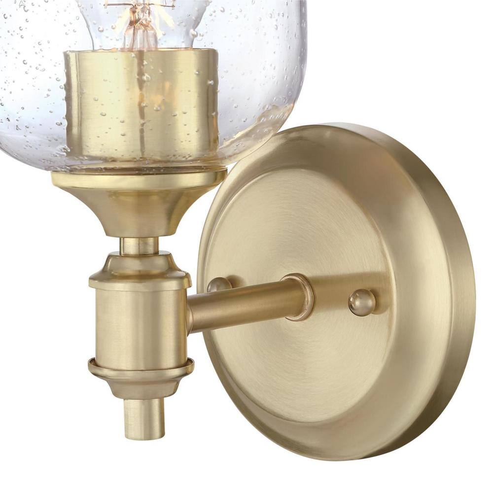 Champagne Brass Cylinder Sconce with Seeded Glass Shade