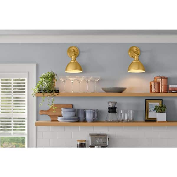 Franklin 1-light wired Sconce aged brass finished and white accent finish inside the metal shade