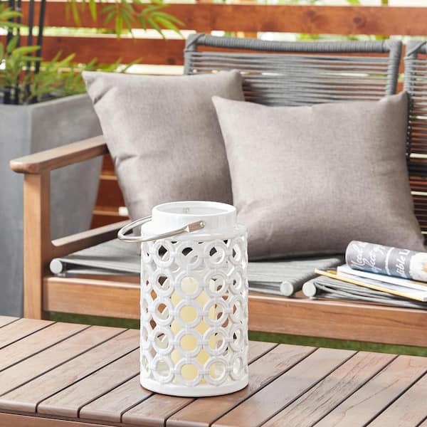 11 in. H White Ceramic Circles Decorative Candle Lantern with Cut Out Design
