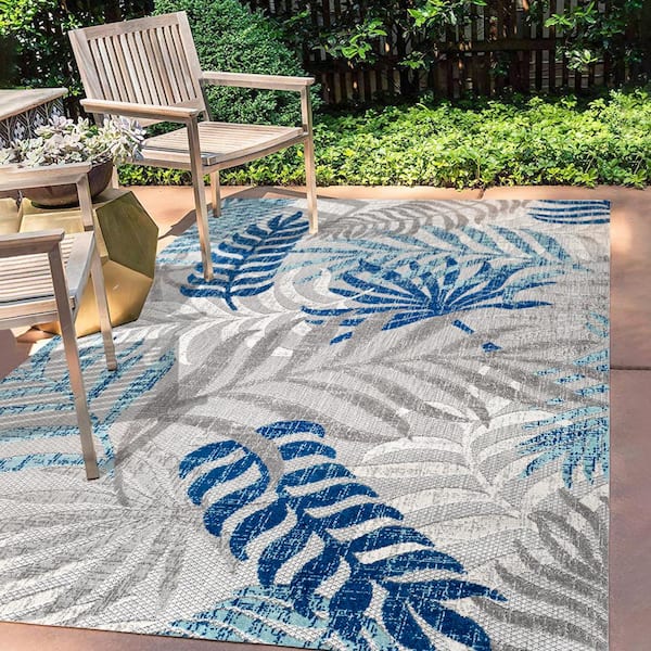 https://images.thdstatic.com/productImages/4ce50964-789b-4aa5-98f7-1858f51bb89d/svn/gray-blue-jonathan-y-outdoor-rugs-amc100a-3-40_600.jpg