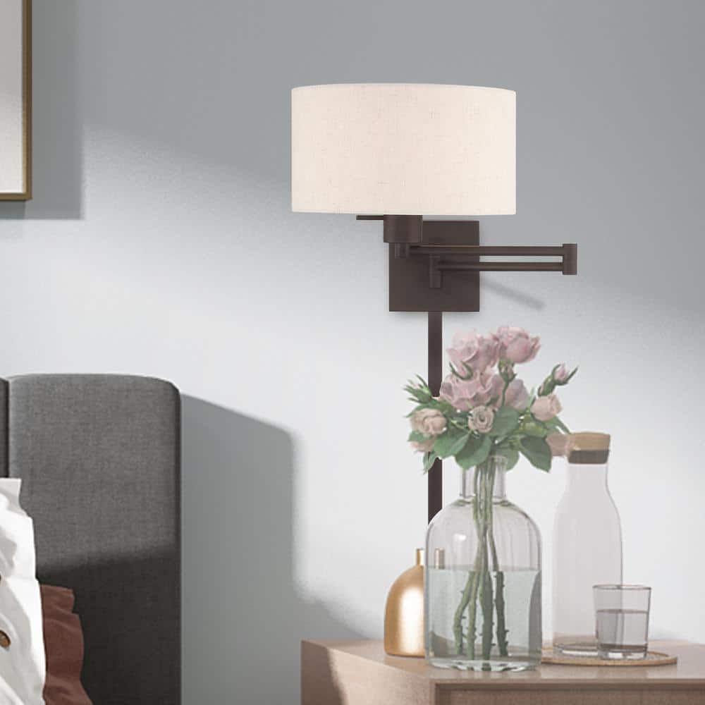 Bronze Swing Arm Wall Lamp with Oatmeal Shade
