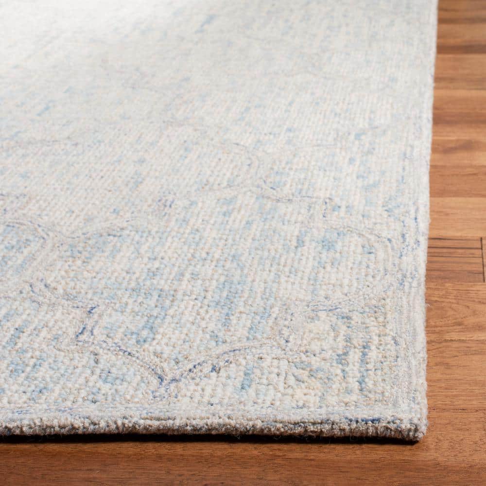 Ivory and Light Blue Handmade Wool Abstract Area Rug
