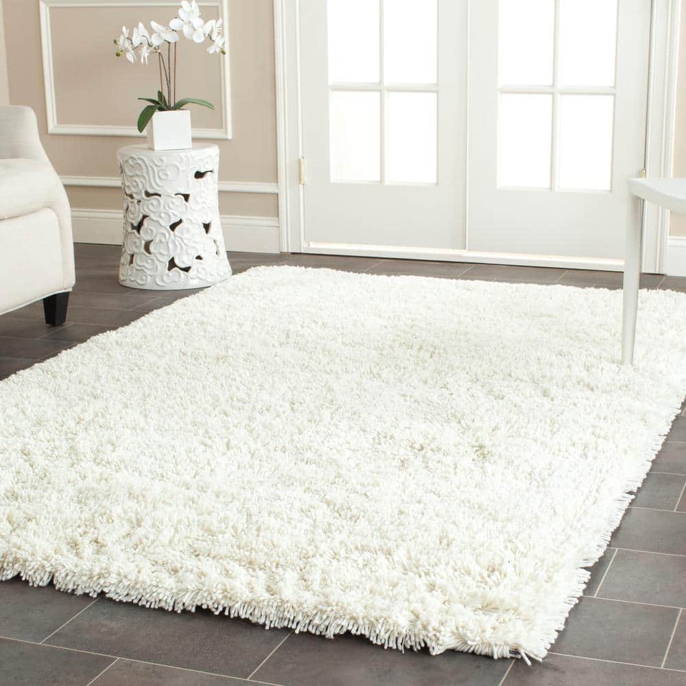 Ivory Hand-Tufted Shag Area Rug 4' x 6'