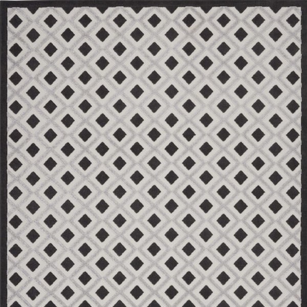 Black, White 9 ft. x 12 ft. Woven Polypropylene Indoor/Outdoor Area Rug