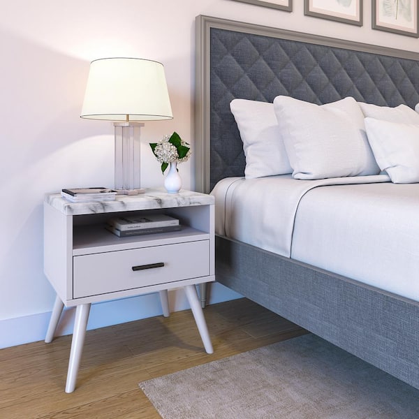 White nightstand deals with marble top