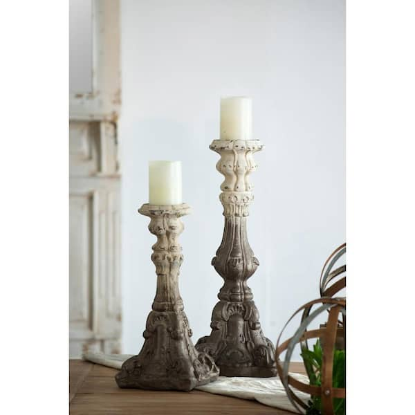 https://images.thdstatic.com/productImages/4d38c65d-8e09-4b84-b543-bf36fe56b21e/svn/white-gold-a-b-home-candle-holders-76556-64_600.jpg