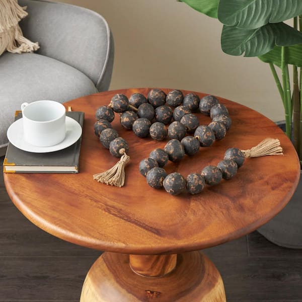 Litton Lane Black Handmade Ceramic Round Intricately Shaped Large Distressed Beaded Garland with Tassel