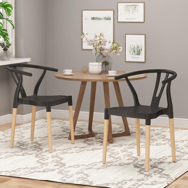 black and natural wood dining chairs