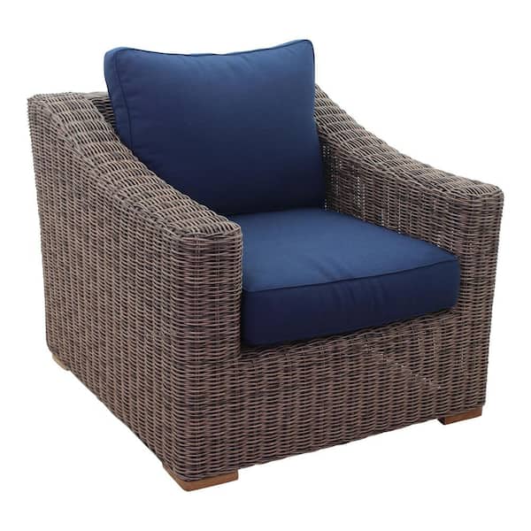 Courtyard Casual Tivoli Club Chair in Teak Full Round Wicker Aluminium Frame Polyester with Navy Cushions