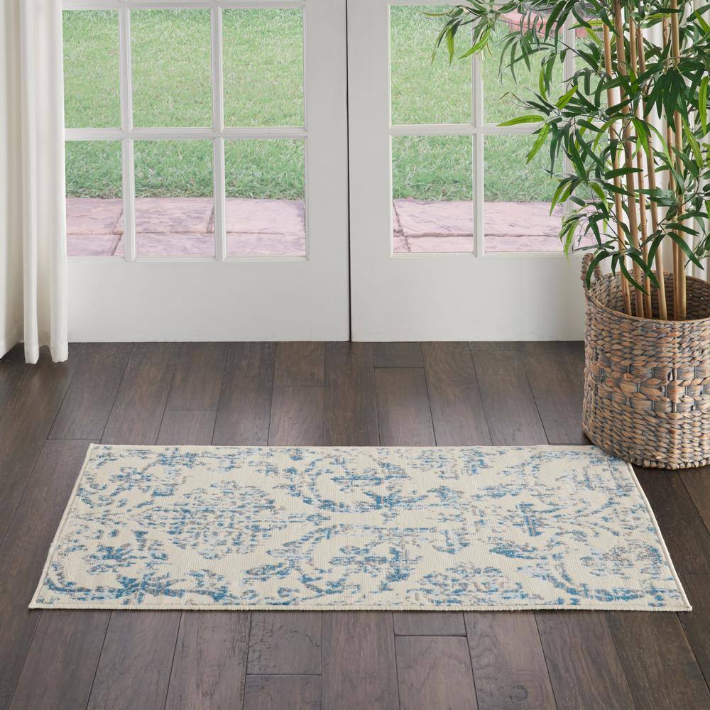 Nourison Jubilant Ivory & Blue Hand-Knotted Spot Rug, 2' x 4'