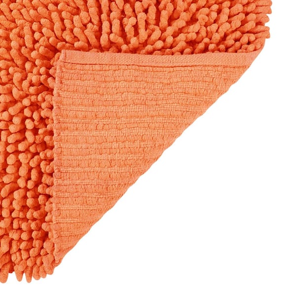 https://images.thdstatic.com/productImages/4d8c8991-8c5b-4c13-a256-47b35abf7856/svn/orange-bathroom-rugs-bath-mats-ss-balc24or-66_600.jpg