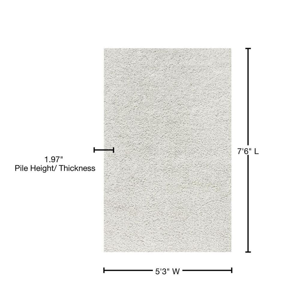 Luxurious White 5' x 8' Plush Shag Area Rug with Tassels