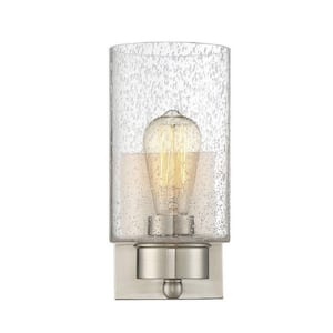 Meridian 5 in. W x 10.5 in. H 1-Light Brushed Nickel Wall Sconce with Clear Seeded Glass Shade