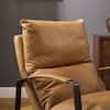 Close-up of the backrest and armrest of a light brown leather lounge chair.