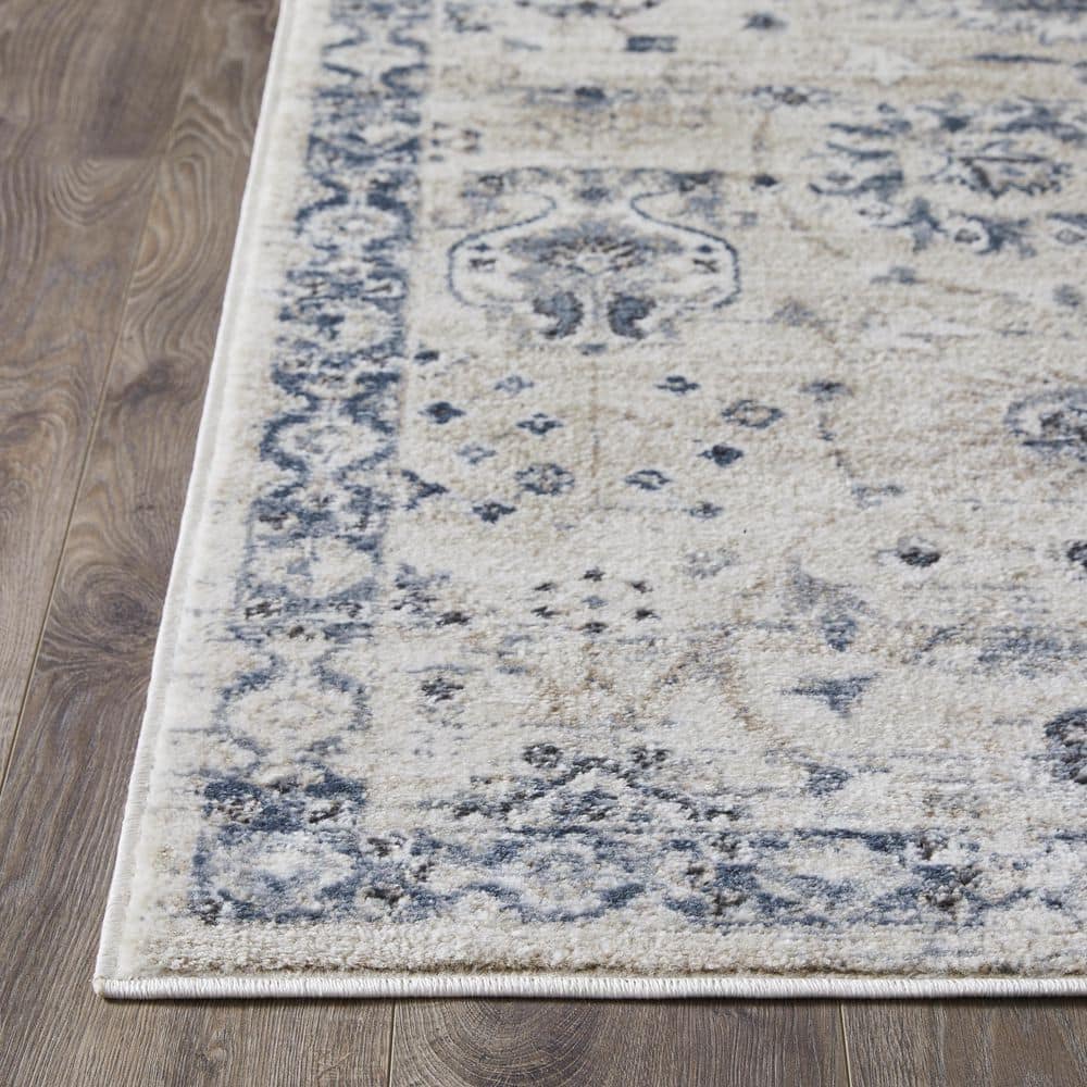 Kehleigh Aylesh 9' x 12' Blue and Cream Synthetic Area Rug