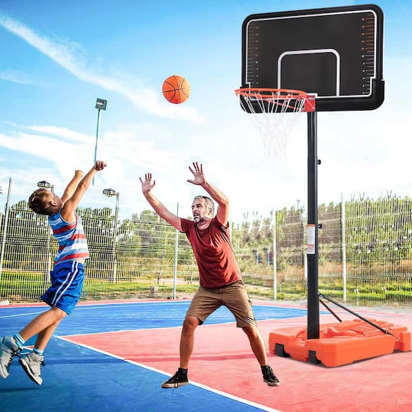 Premium Photo  Two players in the center of the basketball field on  outdoor court.