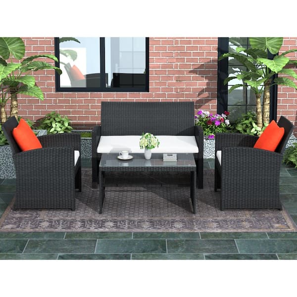 GOSHADOW Black 4-Pieces Wicker Patio Conversation Sectional Seating Set with White Cushions Tempered Glass Tabletop Lawn Backyard