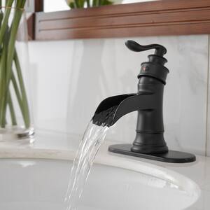 Waterfall Single Hole Single-Handle Low-Arc Bathroom Faucet With Pop-up Drain Assembly In Matte Black