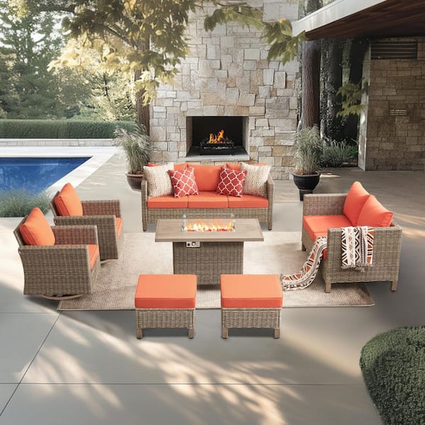 7-Piece Wicker Outdoor Patio Conversation Set with Orange Cushions and 55000 BTU Propane Fire Pit Table