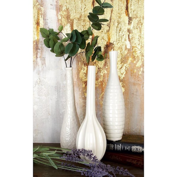 CosmoLiving by Cosmopolitan 3 in., 12 in. White Slim Textured Bottleneck Ceramic Decorative Vase with Varying Patterns (Set of 3)