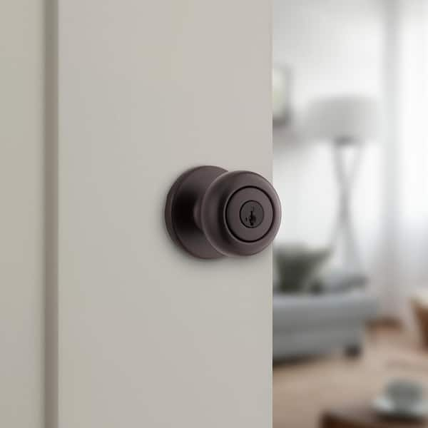 Cove Venetian Bronze Keyed Entry Door Knob featuring SmartKey Security and Microban Technology