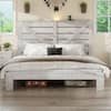 White wood frame king size platform bed with headboard and storage in a bedroom.