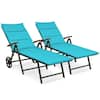Two blue lounge chairs side by side.