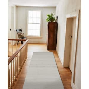 Ivory 2 ft. x 8 ft. Rectangle Solid Color Polyester Area Rug