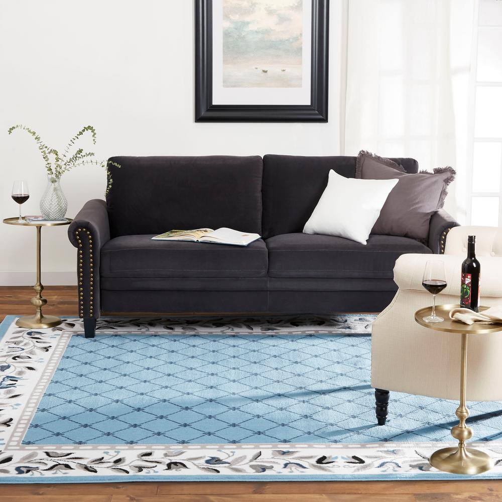 Aydin Blue and Ivory Synthetic Traditional Area Rug