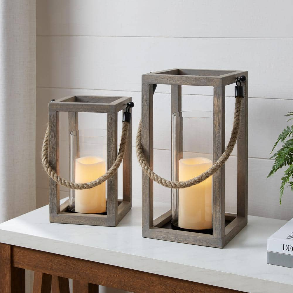 https://images.thdstatic.com/productImages/4e053d3a-78d1-4d73-9110-1ac49cb9d9c9/svn/antique-gray-stylewell-candle-holders-dc20-169351-64_1000.jpg