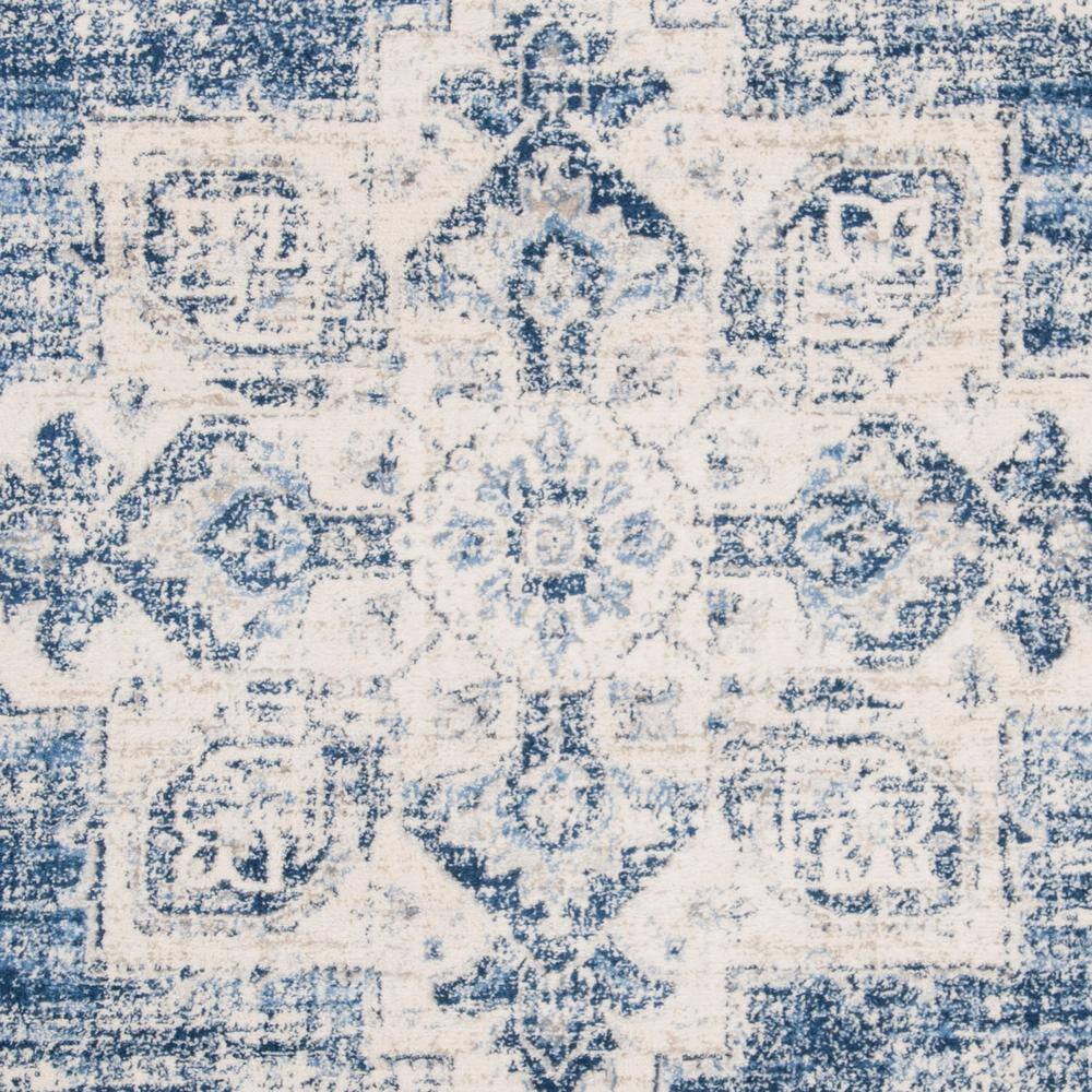 Ivory and Navy Classic Synthetic Round Rug, 6' x 9', Stain-Resistant