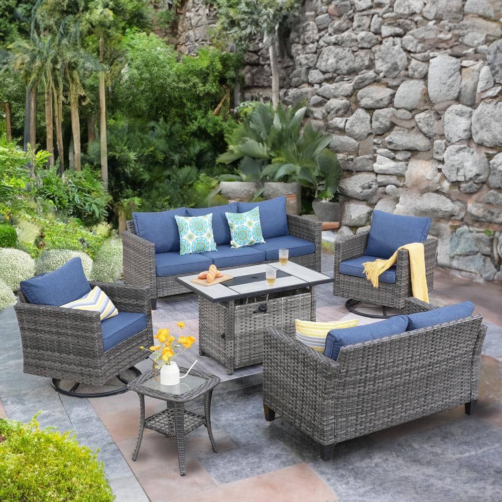 Mirage 6 Piece Wicker Patio Rectangular Fire Pit Set and with Denim Blue Cushions and Swivel Rocking Chairs